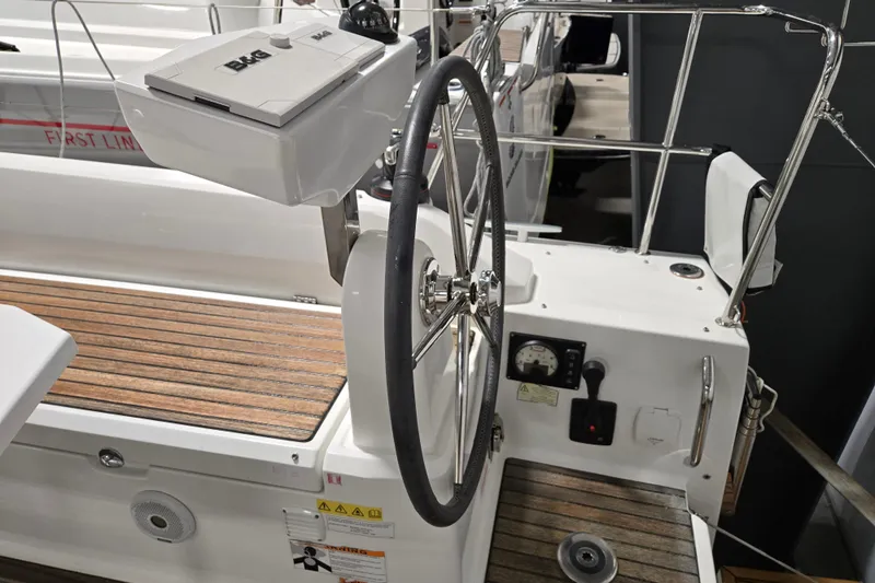 Mahalo Yacht Photos Pics Steering wheel and controls of a 2021 Beneteau Oceanis 30.1 sailboat.