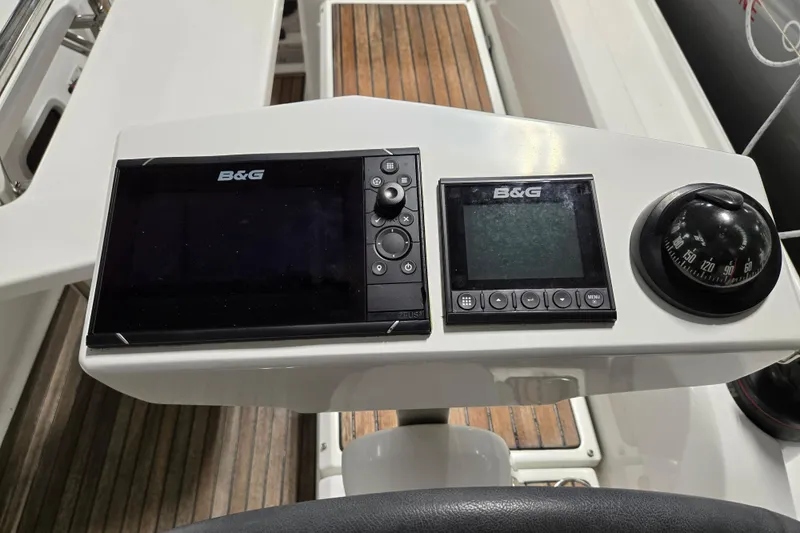 Mahalo Yacht Photos Pics Beneteau Oceanis 30.1 2021 yacht cockpit with B&G navigation instruments and compass.