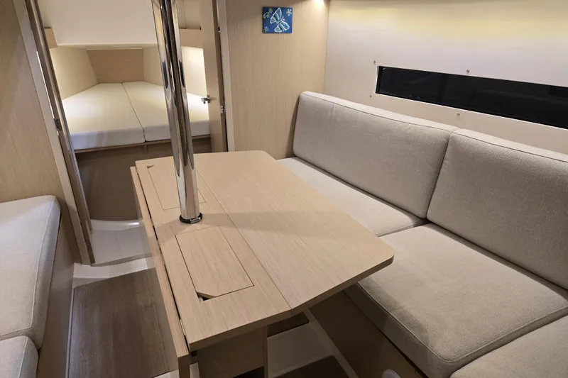 Mahalo Yacht Photos Pics Interior of 2021 Beneteau Oceanis 30.1 yacht, featuring cozy seating and modern design.