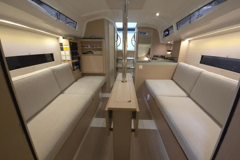 Mahalo Yacht Photos Pics Interior of 2021 Beneteau Oceanis 30.1 yacht, featuring cozy seating and modern design.