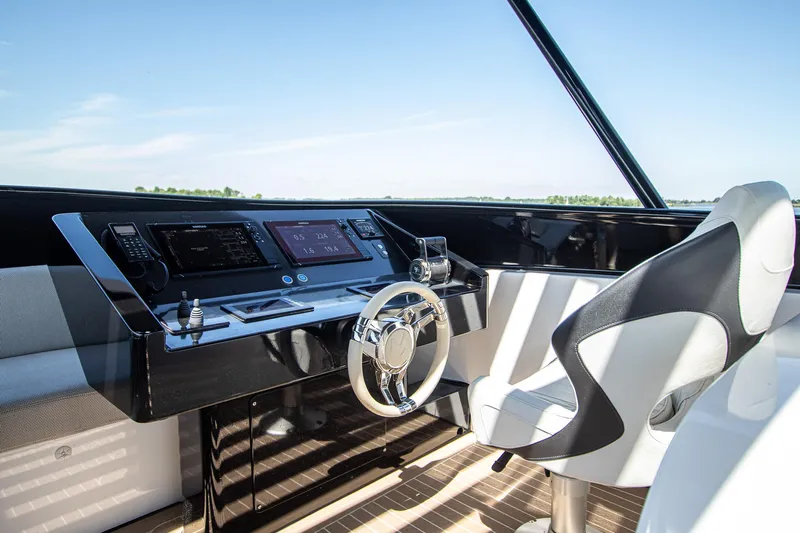  Yacht Photos Pics 2024 Van der Heijden Phantom Expedition yacht helm with modern controls and sleek design.