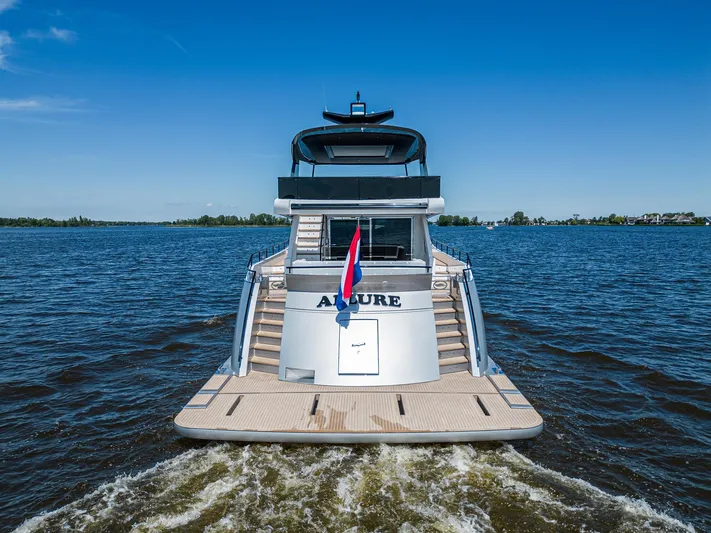  Yacht Photos Pics 2024 Van der Heijden Phantom Expedition yacht on open water, rear view.