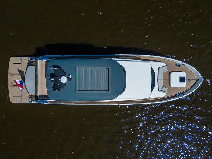  Yacht Photos Pics Aerial view of 2024 Van der Heijden Phantom Expedition yacht on water.