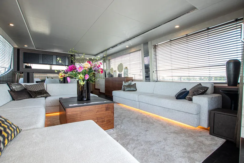  Yacht Photos Pics Luxurious interior of 2024 Van der Heijden Phantom Expedition yacht with modern decor and plush seating.