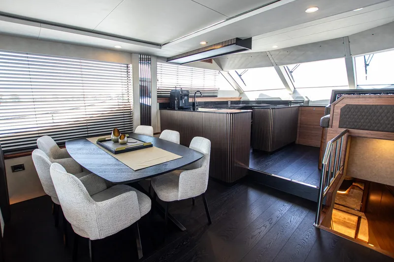  Yacht Photos Pics Luxurious interior of 2024 Van der Heijden Phantom Expedition yacht with modern dining area.