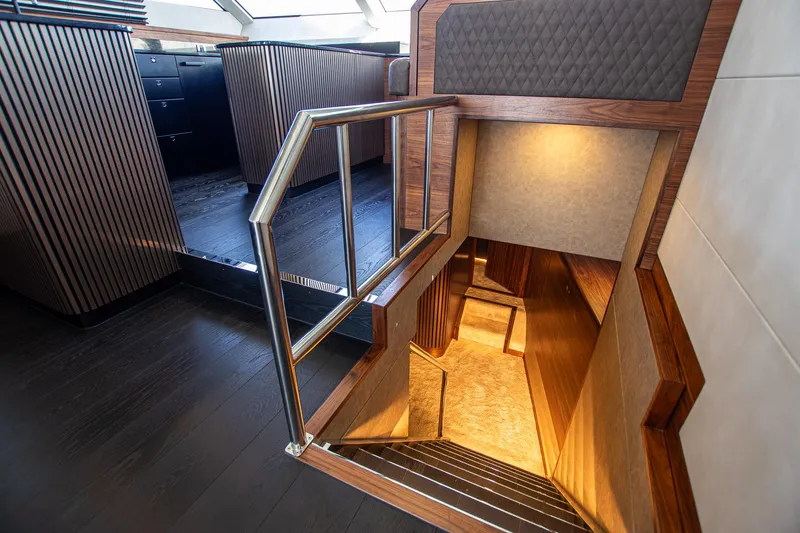  Yacht Photos Pics Luxurious interior staircase of 2024 Van der Heijden Phantom Expedition yacht.