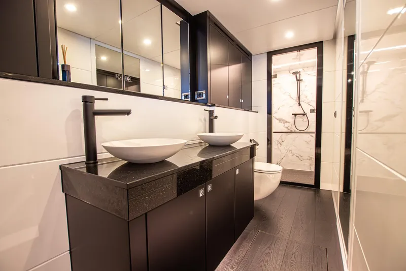  Yacht Photos Pics Luxurious bathroom in 2024 Van der Heijden Phantom Expedition yacht, featuring modern fixtures and elegant design.
