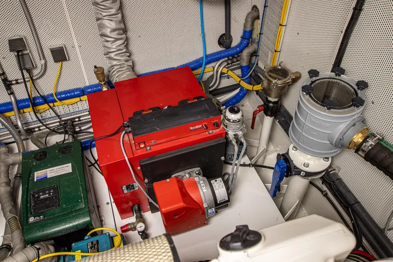  Yacht Photos Pics Engine room of 2024 Van der Heijden Phantom Expedition yacht, featuring complex machinery and wiring.