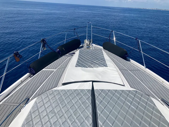 Pura Vida Yacht Photos Pics Deck of Sunseeker Predator 72 yacht, 2007, on open sea.