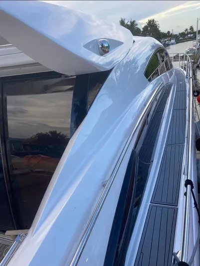 Pura Vida Yacht Photos Pics 2007 Sunseeker Predator 72 yacht docked.