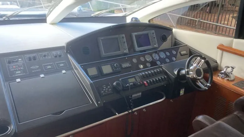 Pura Vida Yacht Photos Pics Helm of Sunseeker Predator 72 yacht, 2007 model.