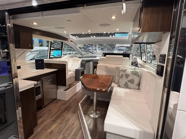2024 Cruisers 42 Cantius Yacht Photos Pics Luxurious interior of 2024 Cruisers Yachts 42 Cantius with modern seating and elegant design.