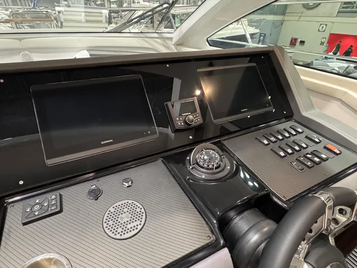 2024 Cruisers 42 Cantius Yacht Photos Pics 2024 Cruisers Yachts 42 Cantius helm with advanced navigation displays and controls.