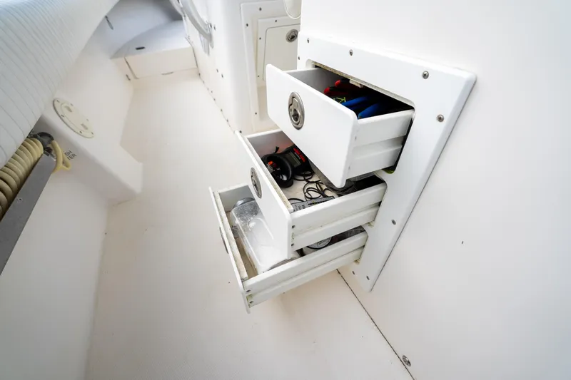  Yacht Photos Pics Open storage drawers on a 2003 Regulator 32 Center Console boat.