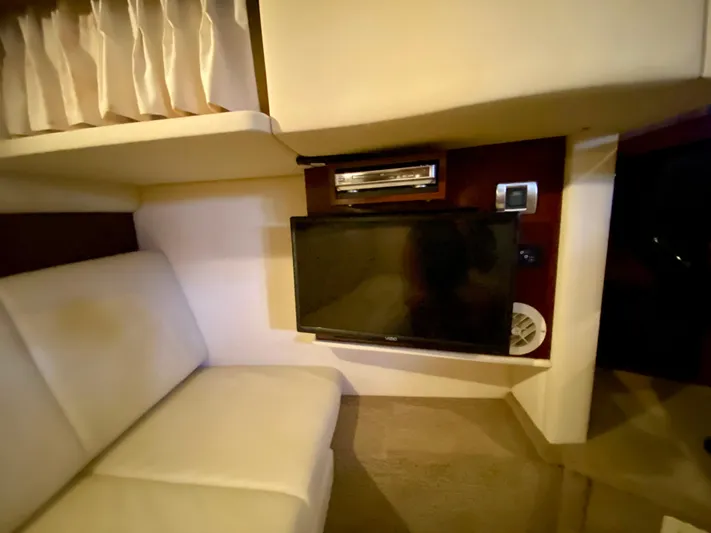  Yacht Photos Pics Interior of 2008 Sea Ray 38 Sundancer with TV and seating area.
