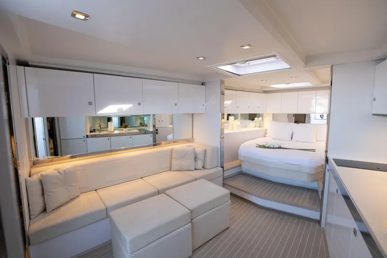 M/y 55 Van Dutch Yacht Photos Pics Luxurious interior of 2017 VanDutch 55 yacht with modern seating and bedroom.