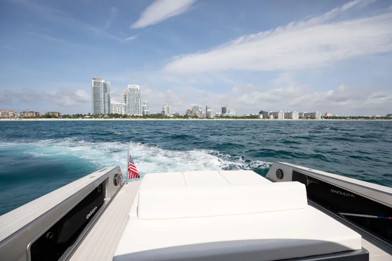 M/y 55 Van Dutch Yacht Photos Pics VanDutch 55 yacht cruising near city skyline, 2017 model, ocean view.