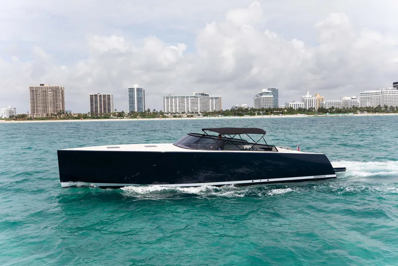 M/y 55 Van Dutch Yacht Photos Pics VanDutch 55 yacht cruising near a city skyline, 2017 model.
