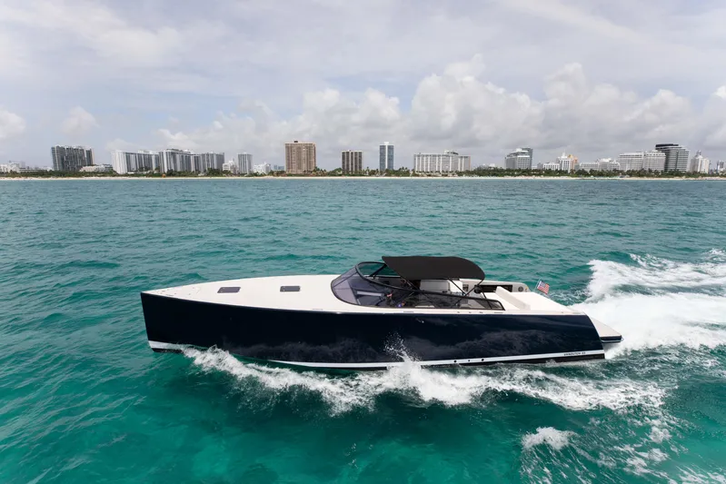 M/y 55 Van Dutch Yacht Photos Pics VanDutch 55 yacht cruising on ocean near city skyline, 2017 model.