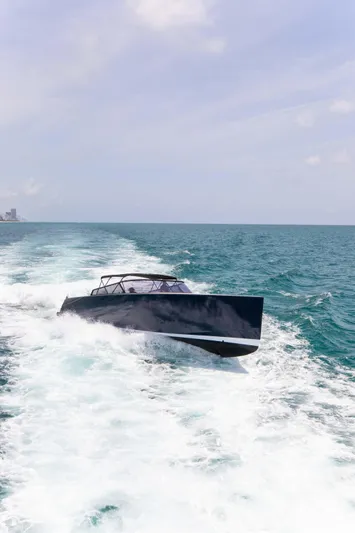 M/y 55 Van Dutch Yacht Photos Pics 2017 VanDutch 55 yacht cruising on open sea under clear sky.