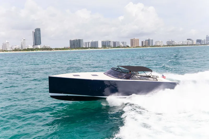 M/y 55 Van Dutch Yacht Photos Pics VanDutch 55 yacht cruising near city skyline, 2017 model.