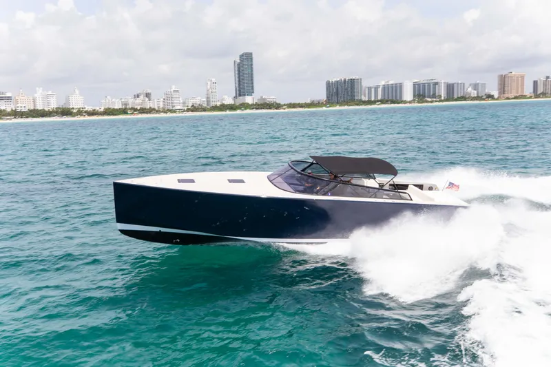 M/y 55 Van Dutch Yacht Photos Pics VanDutch 55 yacht cruising on ocean near city skyline, 2017 model.