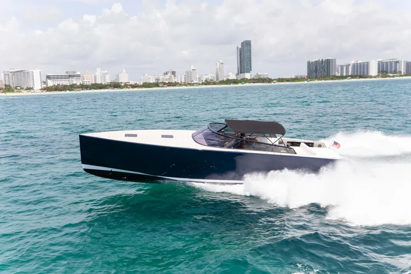 M/y 55 Van Dutch Yacht Photos Pics VanDutch 55 yacht cruising on ocean near city skyline, 2017 model.