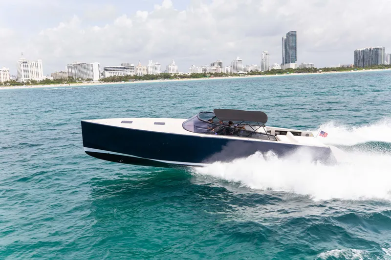 M/y 55 Van Dutch Yacht Photos Pics VanDutch 55 yacht cruising on ocean near city skyline, 2017 model.