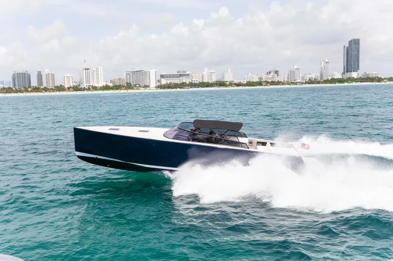 M/y 55 Van Dutch Yacht Photos Pics VanDutch 55 yacht cruising near city skyline, 2017 model.