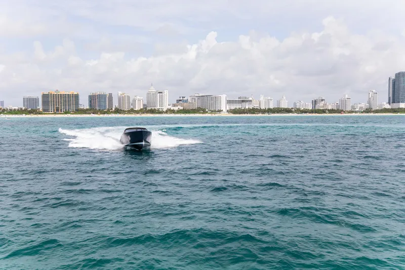 M/y 55 Van Dutch Yacht Photos Pics VanDutch 55 yacht cruising near a city skyline, 2017 model.