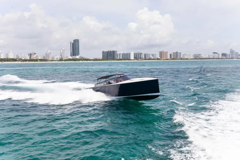 M/y 55 Van Dutch Yacht Photos Pics VanDutch 55 yacht cruising on ocean near city skyline, 2017 model.