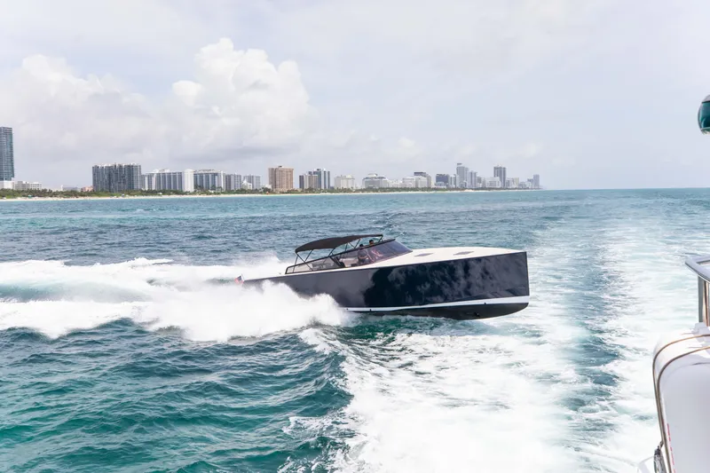 M/y 55 Van Dutch Yacht Photos Pics VanDutch 55 yacht cruising on ocean near city skyline, 2017 model.