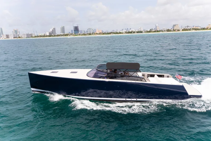 M/y 55 Van Dutch Yacht Photos Pics VanDutch 55 yacht cruising on ocean near city skyline, 2017 model.