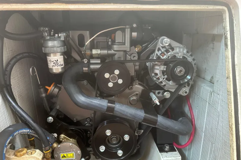 Ibis Yacht Photos Pics Engine compartment of a 2006 Morris M36, showcasing belts and components.