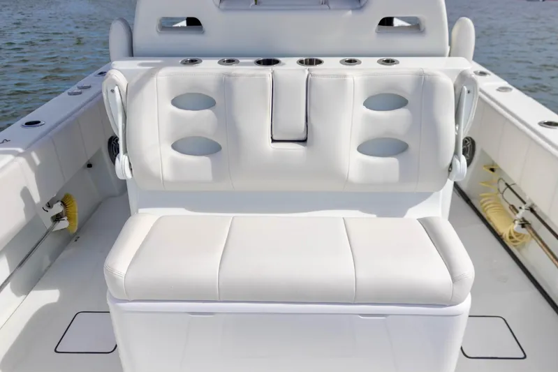  Yacht Photos Pics 2020 Contender 39 ST boat interior with white cushioned seating.