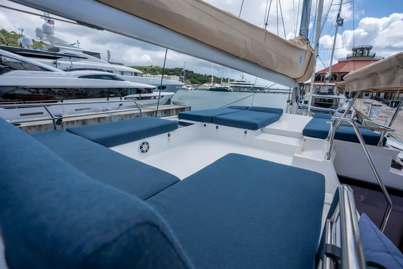  Yacht Photos Pics Luxurious 2020 Fountaine Pajot SABA 50 catamaran with spacious blue seating at marina.