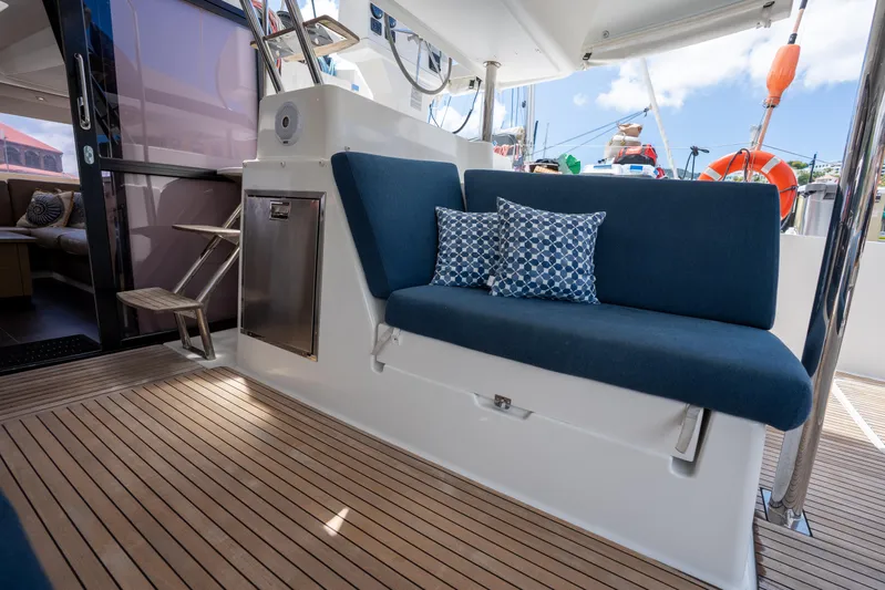  Yacht Photos Pics Fountaine Pajot SABA 50 yacht interior with blue seating and patterned cushions, 2020 model.