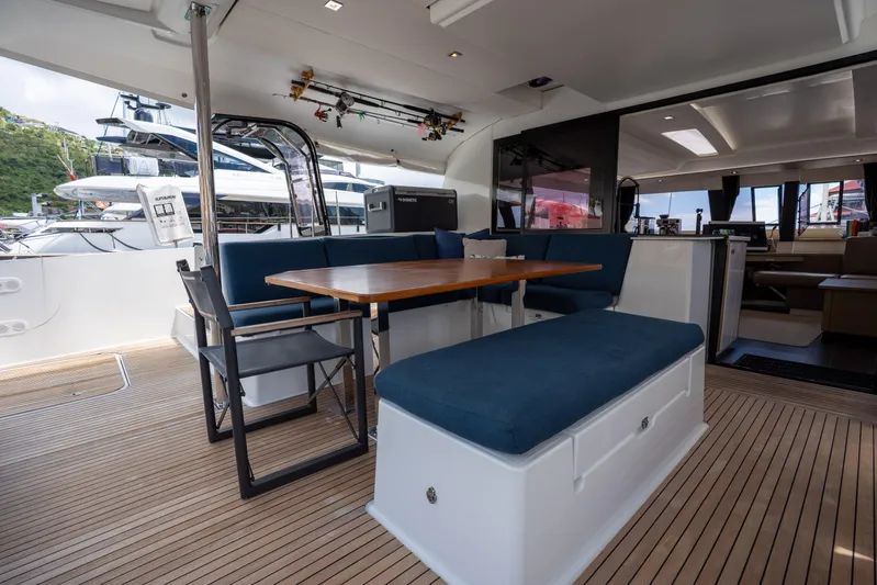  Yacht Photos Pics Luxurious 2020 Fountaine Pajot SABA 50 yacht interior with elegant seating and dining area.