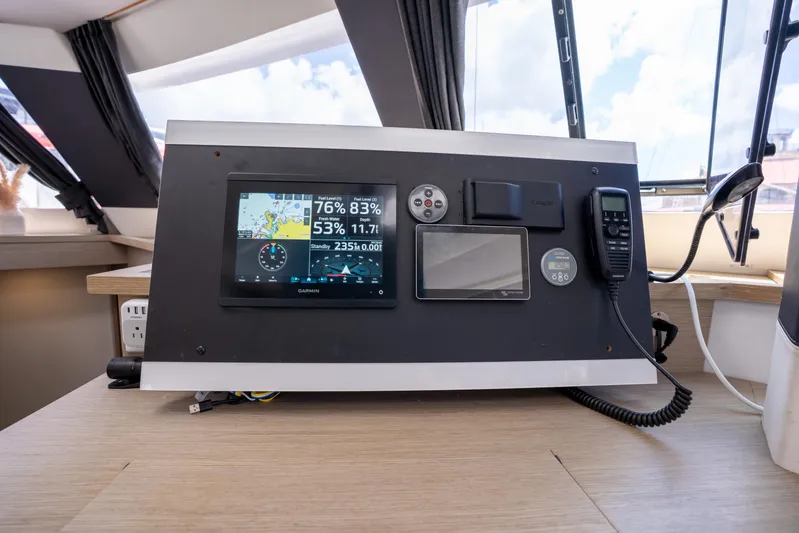  Yacht Photos Pics Control panel of 2020 Fountaine Pajot SABA 50 catamaran with navigation and communication equipment.