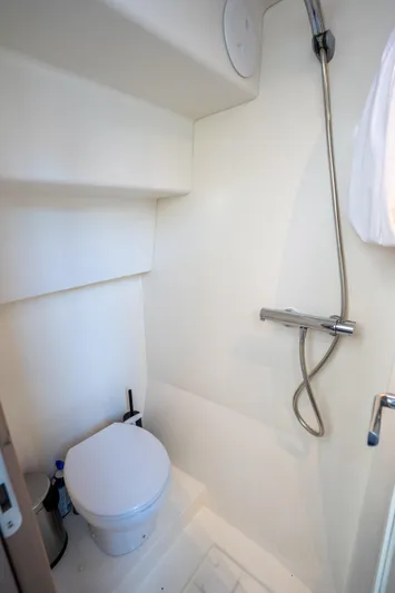  Yacht Photos Pics 2020 Fountaine Pajot SABA 50 bathroom with shower and toilet, featuring modern design.