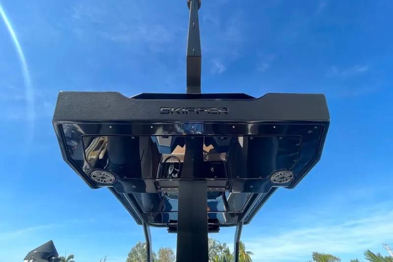  Yacht Photos Pics 2023 Skipper-BSK BSK 38 boat canopy against clear blue sky.