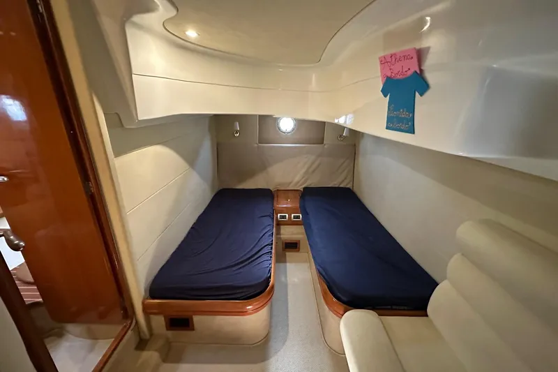  Yacht Photos Pics 2006 Cranchi Mediterranee 47 HT cabin with twin beds and modern interior design.