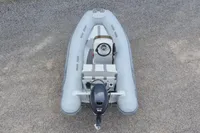 2024 AB Inflatables 10 ALX boat, top view on gravel surface.