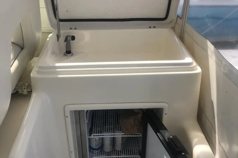  Yacht Photos Pics 1998 Tiara Yachts 3700 Open interior with sink and mini fridge.