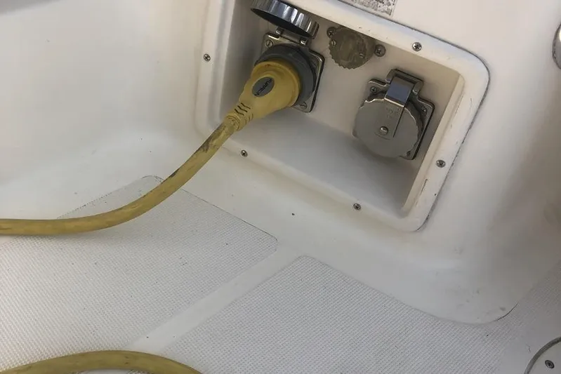  Yacht Photos Pics Yellow power cable connected to a 1998 Tiara Yachts 3700 Open.