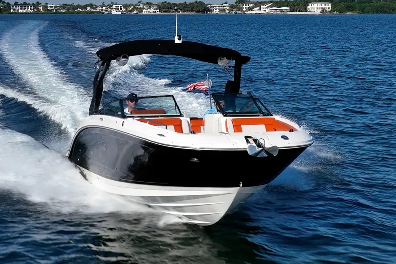 Ceci Yacht Photos Pics 2019 Sea Ray SDX 290 Outboard cruising on blue water, showcasing sleek design and performance.