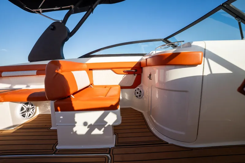 Ceci Yacht Photos Pics 2019 Sea Ray SDX 290 Outboard interior with orange seating and sleek design.