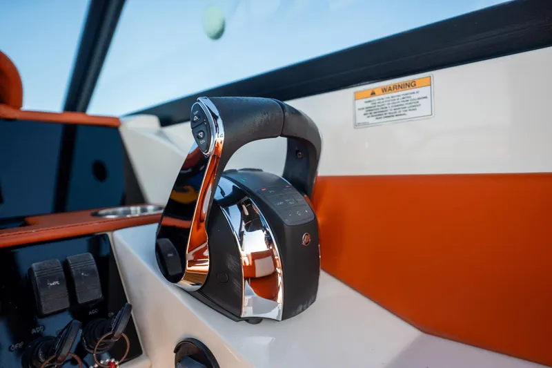 Ceci Yacht Photos Pics Throttle control of 2019 Sea Ray SDX 290 Outboard boat, featuring sleek design and modern controls.