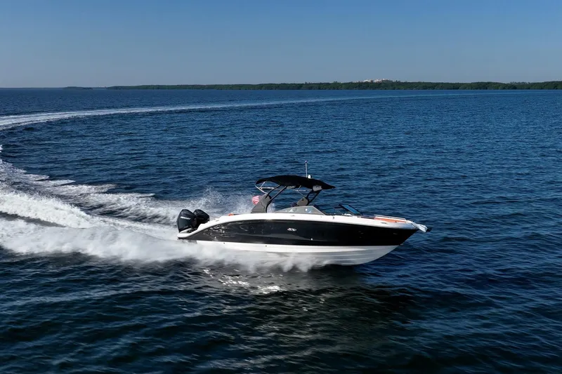 Ceci Yacht Photos Pics 2019 Sea Ray SDX 290 Outboard cruising on open water, creating a dynamic wake.