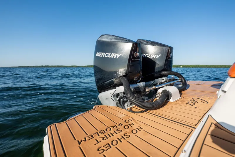 Ceci Yacht Photos Pics 2019 Sea Ray SDX 290 Outboard with twin Mercury engines on a sunny day.